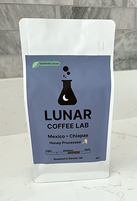 Lunar Coffee Lab Mexico Chiapas honey-processed coffee in a white pouch with a periwinkle label and the moon-and-flask mark.