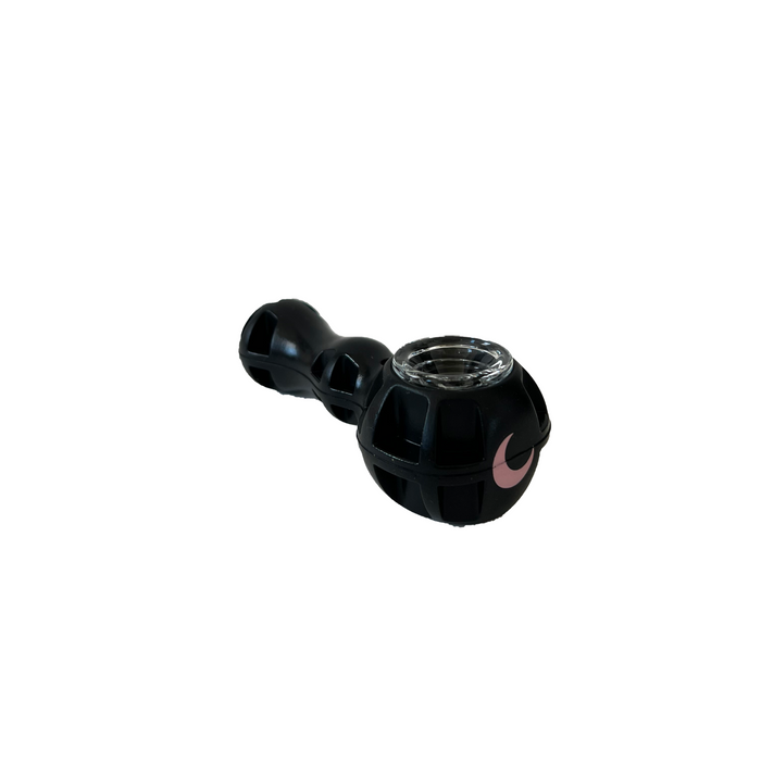 Black textured silicone spoon piece with a removable glass bowl and blush moon mark, on white.