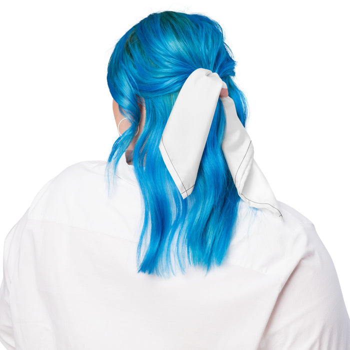White bandana tied at the back of the head over bright blue hair.