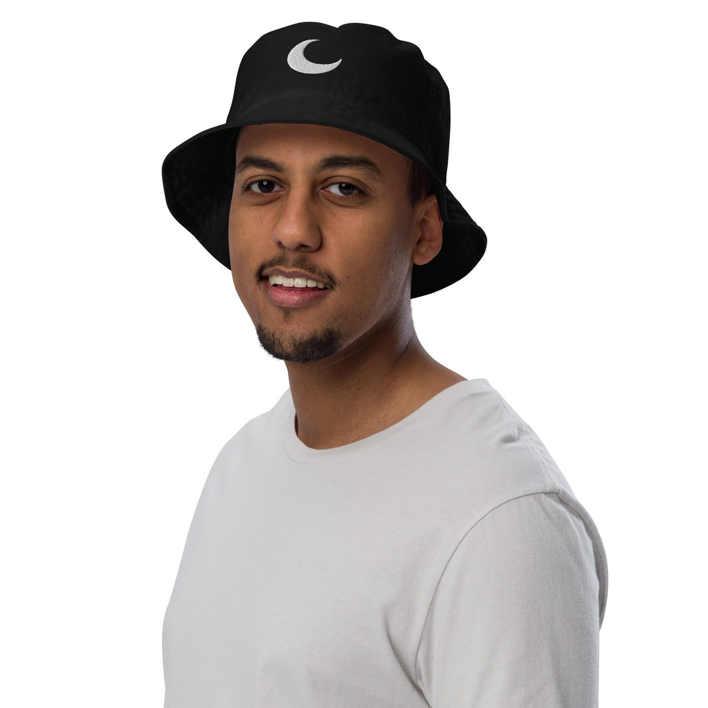 Black organic bucket hat with a white crescent moon embroidered at the front.