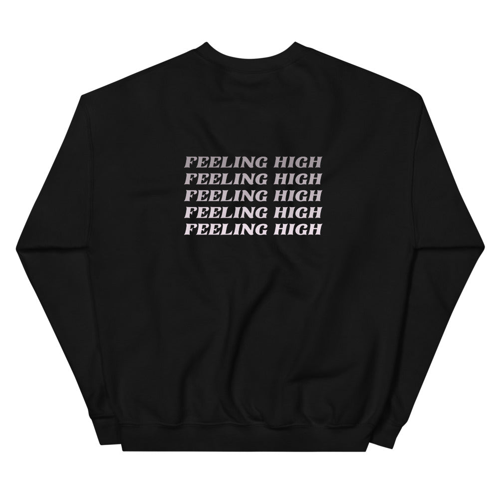 Black crewneck sweatshirt shown from the back, printed with a repeating blush slogan across the shoulders.