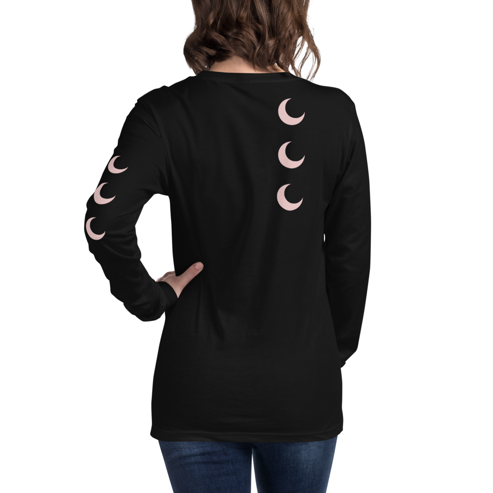 Black long sleeve tee worn back-to-camera, with blush crescent moons falling down the spine and one sleeve.